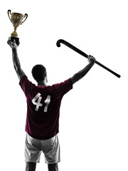 Naklejka premium one caucasian field hockey player man isolated silhouette on white background