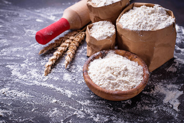 Wheat flour, ears and rolling pin
