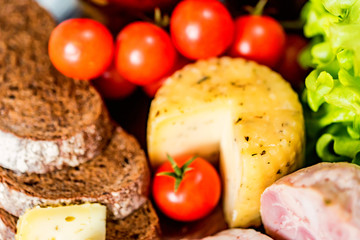 Cheese, turkey roll and vegetables