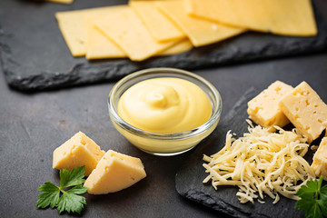 Homemade cheese sauce in glass bowl