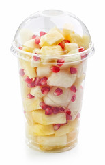 fresh fruit pieces salad in plastic cup