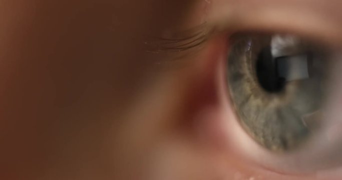 Macro Shot of Digital Display reflected in human eye