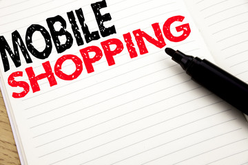 Mobile Shopping. Business concept for Cellphone online order written on notebook with copy space on book background with marker pen