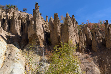 Fototapeta na wymiar Amazing Autumn Landscape of Rock Formation Devil's town in Radan Mountain, Serbia