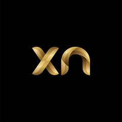 Initial lowercase letter xn, swirl curve rounded logo, elegant golden color on black background