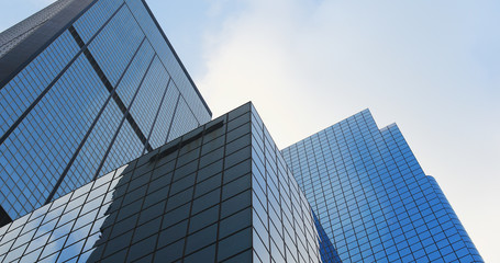 Fototapeta na wymiar Business office tower with sunny skyline
