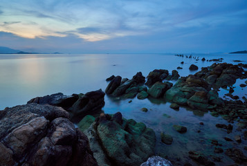Sea lagoon with rocks  at sunset time