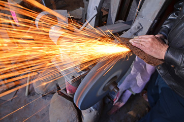 Sparks flying from a grinding wheel    