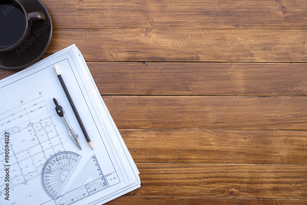 Poster flat lay of top view desk work table architect with drawing home plan building and stationary on ant