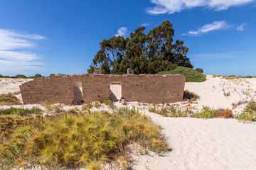 Ruins of the remote and isolated historic Eucla Telegraph Station overun by shifting sands at Eucla on the Nullabor Plain in Western Australia.