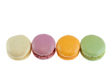 Colorful macarons isolated on the white background