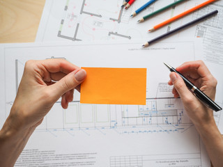 Business card on the background of an architectural project. The concept for the business project.
