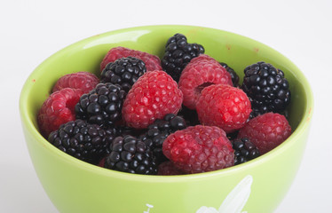 raspberry and blackberry on white isolated background