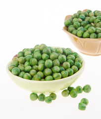 nuts or crispy coated green pea on the background.