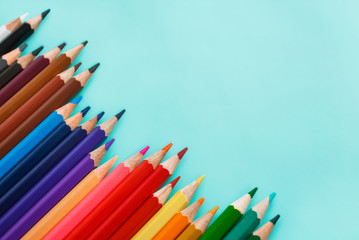 colored pencils on pastel background