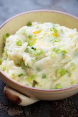 Close-up of Irish champ or traditional mashed potato with addition of green onion, selective focus