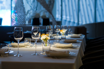 Empty glasses wine in restaurant. Glass water.dish spoon fork on table at restaurant