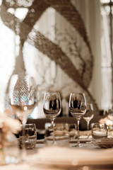 Empty glasses wine in restaurant. Glass water.dish spoon fork on table at restaurant