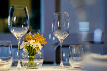 Empty glasses wine in restaurant. Glass water.dish spoon fork on table at restaurant