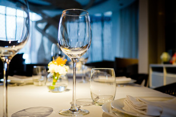 Empty glasses wine in restaurant. Glass water.dish spoon fork on table at restaurant