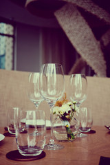 Empty glasses wine in restaurant. Glass water.dish spoon fork on table at restaurant