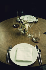 Empty glasses wine in restaurant. Glass water.dish spoon fork on table at restaurant