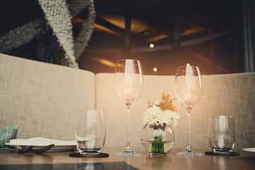 Empty glasses wine in restaurant. Glass water.dish spoon fork on table at restaurant