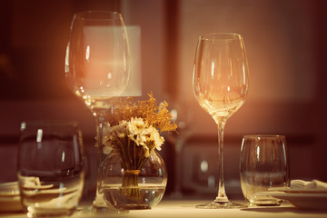 Empty glasses wine in restaurant. Glass water.dish spoon fork on table at restaurant