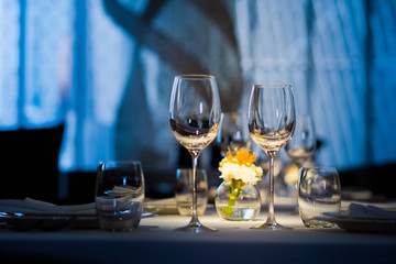 Empty glasses wine in restaurant. Glass water.dish spoon fork on table at restaurant