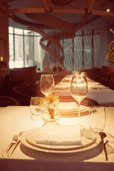 Empty glasses wine in restaurant. Glass water.dish spoon fork on table at restaurant