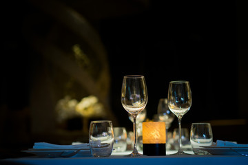 Empty glasses wine in restaurant. Glass water.dish spoon fork on table at restaurant