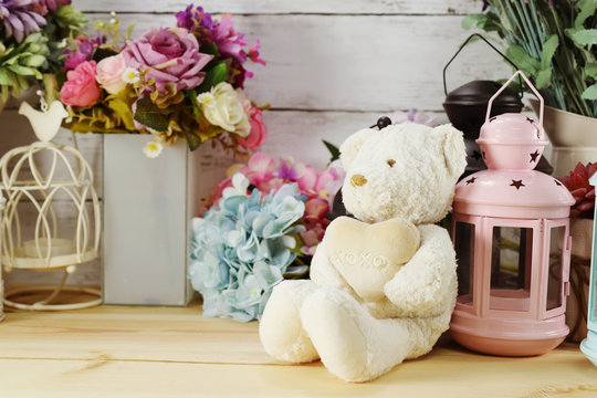 beautiful interior decoration teddey bear with different home related objects