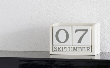 White block calendar present date 7 and month September