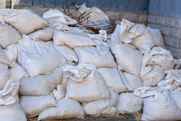 Mountain of bags with construction garbage