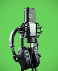 Professional microphone and headphones for voice recording on chroma key
