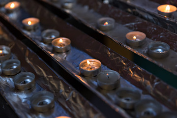 votive candles in the church