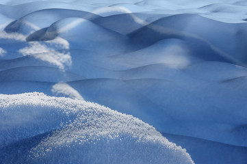 Fototapeta na wymiar a blue snow texture - close up detail