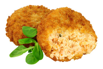 Breadcrumb covered salmon fish cakes isolated on a white background