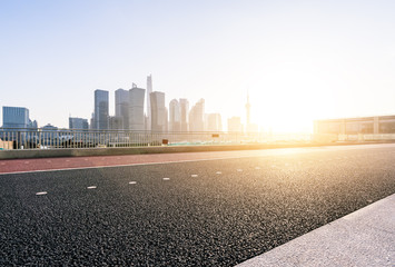 empty road with cityscape