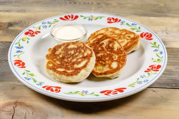 pancakes on the wooden background