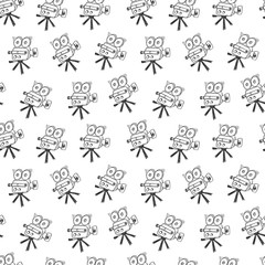 Seamless pattern background with doodle retro movie camera