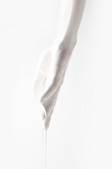 cropped image of girl in white paint dripping isolated on white