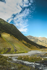 amazing waterfall, river, blue sky and clouds