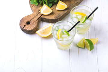 Italian lemon lime liqueur limoncello with ice and mint
