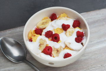 Healthy Breakfast on Rustic Gray Table. Milk and Muesli with Fruits. Top View. Healthy Food Concept.