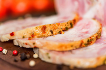 Sliced turkey roll, peppercorn and vegetables