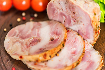 Sliced turkey roll, peppercorn and vegetables