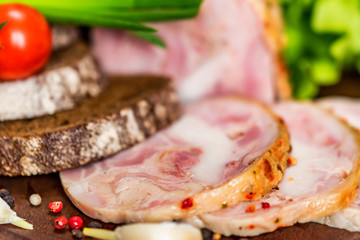 Sliced turkey roll, peppercorn and vegetables