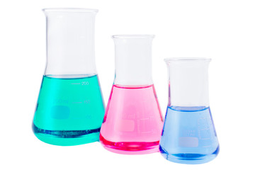 Chemical laboratory beakers and flasks with colorful liquids and reagents. Research science and medical laboratory.