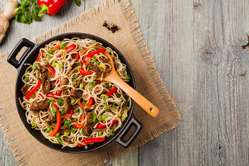 Chinese pasta with beef. Prepared in wok.